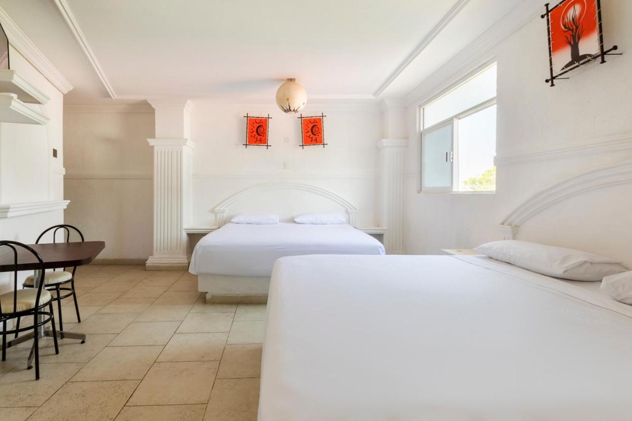 أوكستيبيك Capital O Hotel Partidor Del Sol المظهر الخارجي الصورة