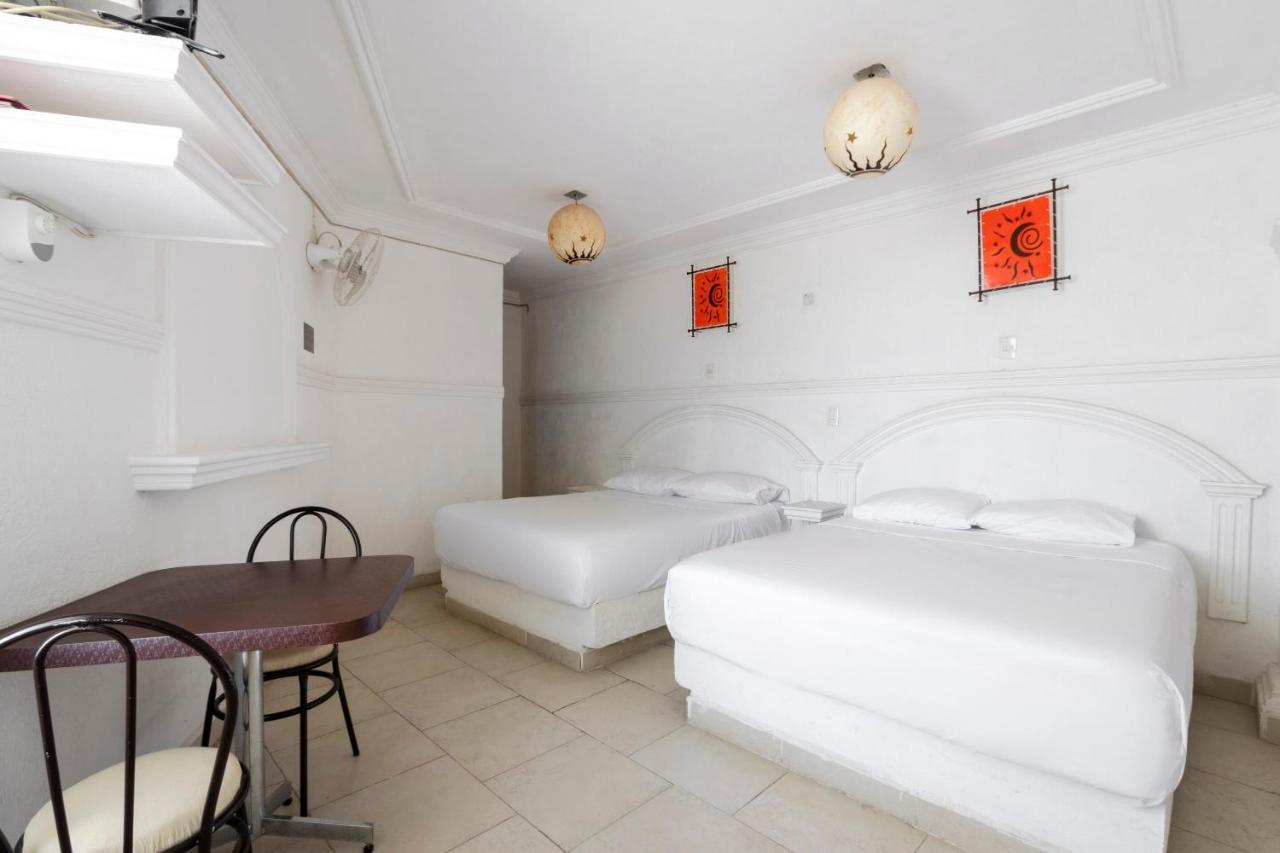 أوكستيبيك Capital O Hotel Partidor Del Sol المظهر الخارجي الصورة