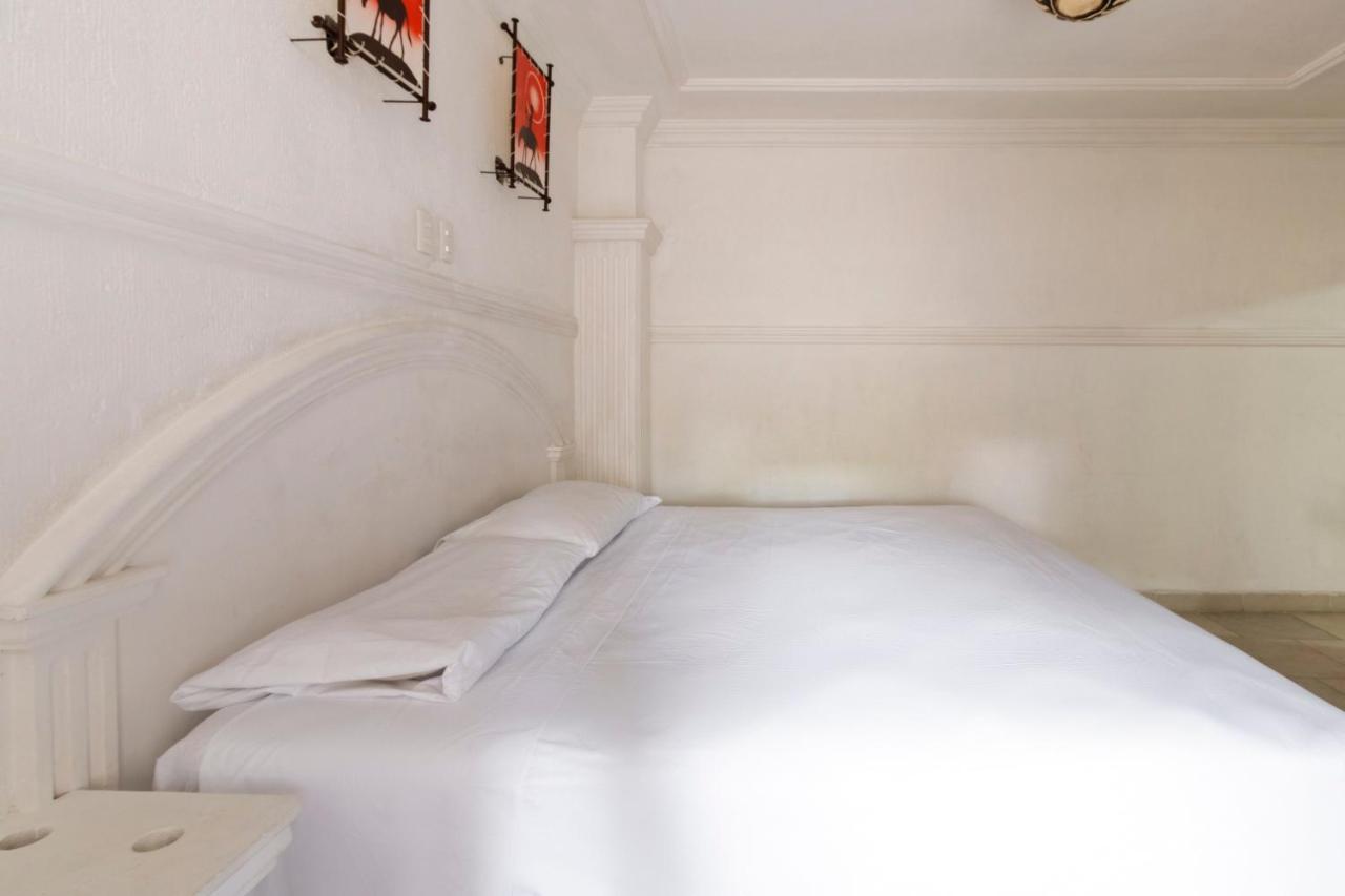 أوكستيبيك Capital O Hotel Partidor Del Sol المظهر الخارجي الصورة