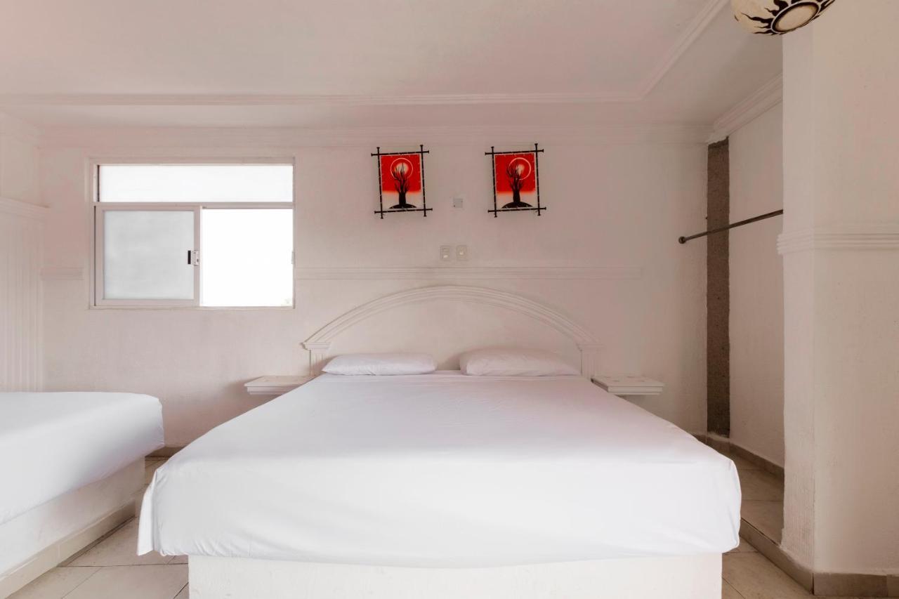 أوكستيبيك Capital O Hotel Partidor Del Sol المظهر الخارجي الصورة
