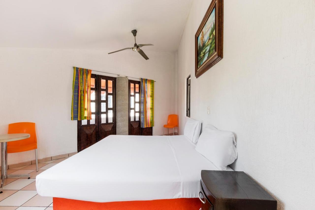 أوكستيبيك Capital O Hotel Partidor Del Sol الغرفة الصورة